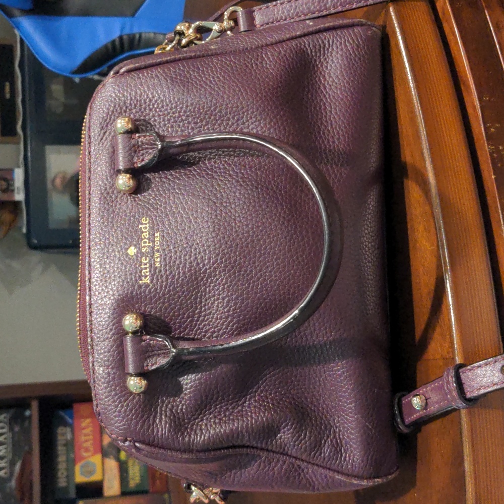 Small cow leather Kate Spade crossbody dark purple bag